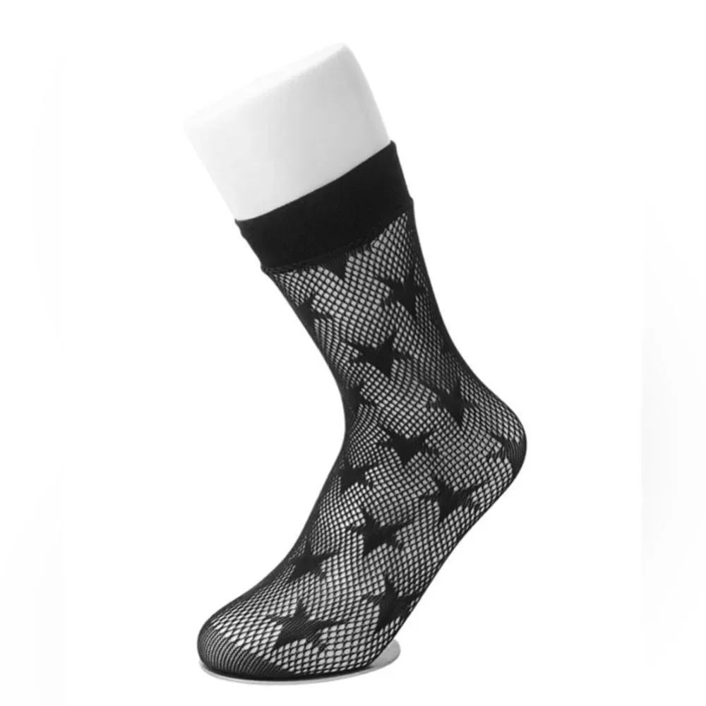 Legale Black mid-calf mesh socks featuring a star pattern